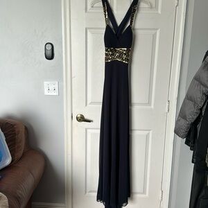 Navy open back gown. Size small. Worn once